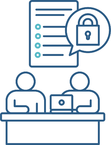 A behaviour support practitioner working with someone at a desk to create a behaviour support plan.