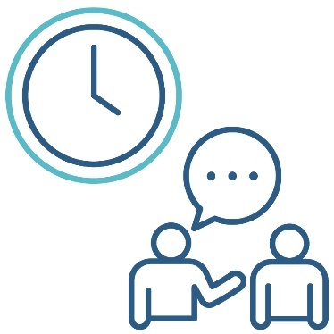 2 people talking. Above them is a clock.