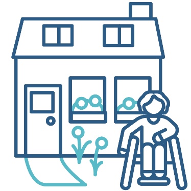 A person with disability in front of their home.