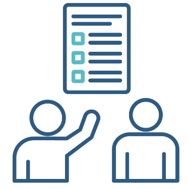 An external practitioner and a person next to a behaviour support plan.