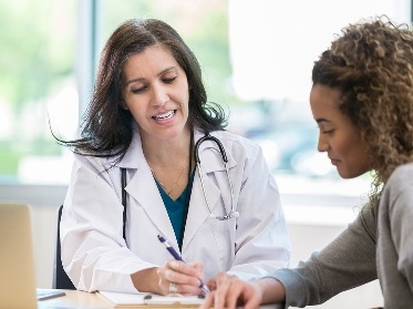 A doctor talking to someone.