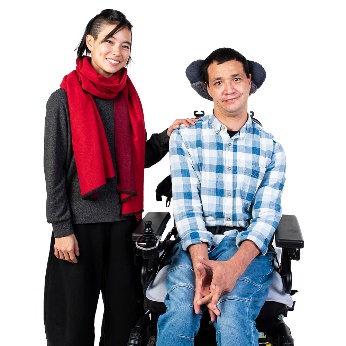 A person supporting a person with disability.