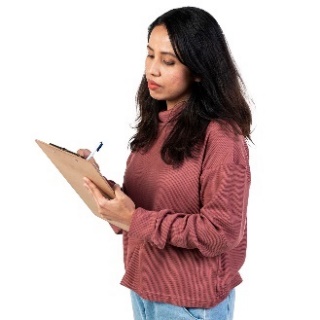 A person writing on a document.