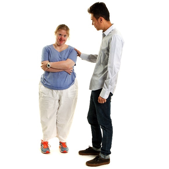 A practitioner supporting a person with disability.
